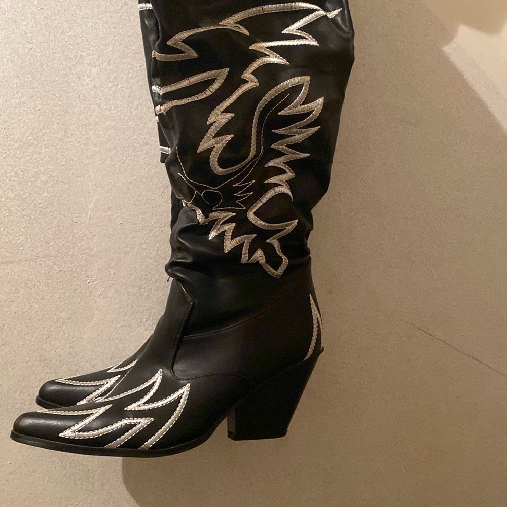 Black and white embroidered thigh high boots